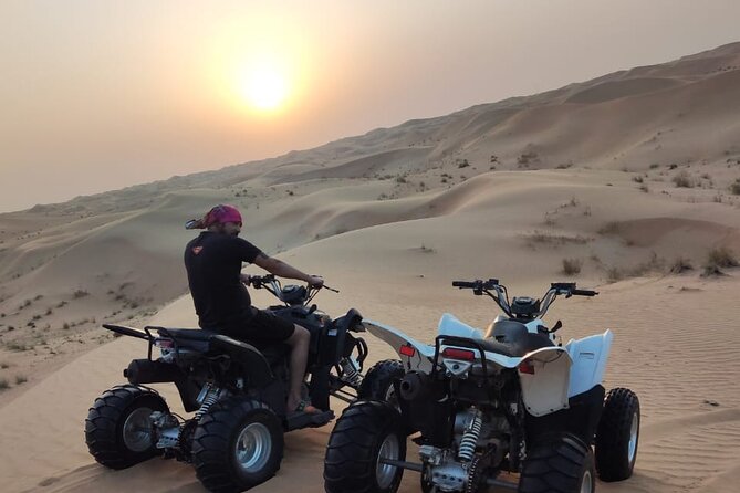 1 hour Quad Biking Experience with pick and drop - Riding your own quad into the Sweihan desert