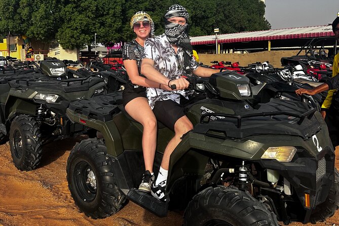 4 Hours Desert Tour with Quad Bike Camel Ride & Sandboard - Sandboarding and sunset photographs