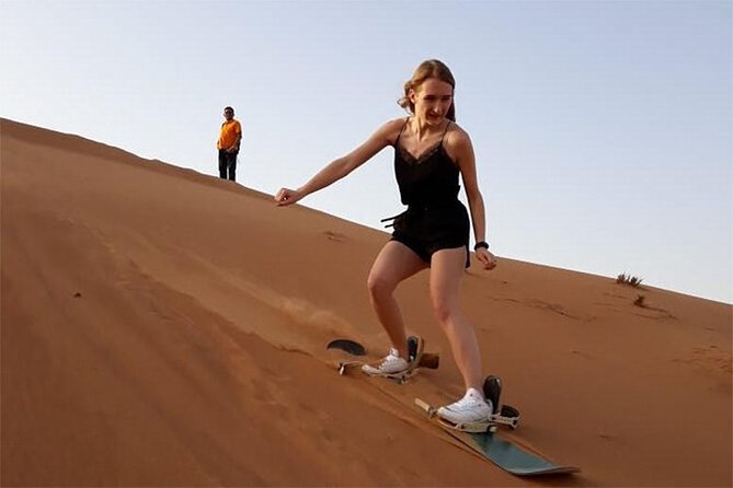 6-Hour Dubai Desert Dinner Safari with Dune Bashing & Camel Ride - The short camel ride and Arabic dress photos