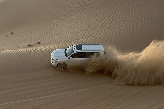 Abu Dhabi: 4-Hour Morning Safari with Camel Ride & Sand boarding - Al Khatim and the first burst of dune bashing