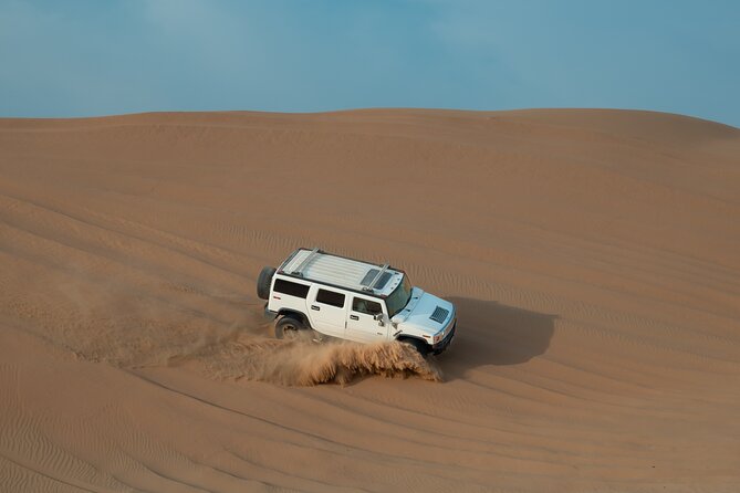 Abu Dhabi: 7-Hours Desert Safari with BBQ, Camel Ride & Sandboarding - Key points at a glance