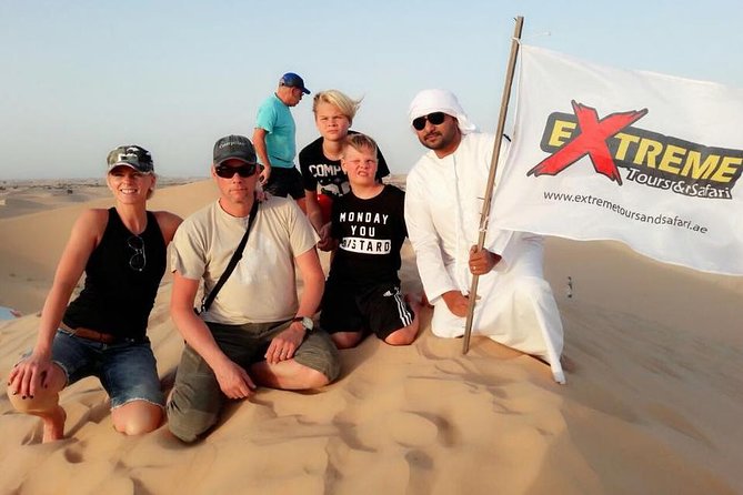 Abu Dhabi: 7-Hours Desert Safari with BBQ, Camel Ride & Sandboarding - Dune bashing with a professional driver