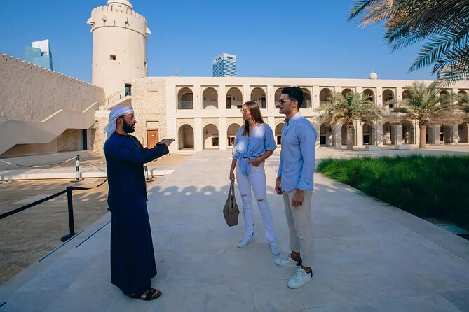 Abu Dhabi City Tour: Grand Mosque, Palace, Souk, Louvre & Ferrari - Dates, local flavor, and the Heritage Village