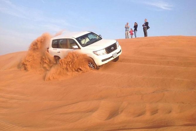 Abu Dhabi City Tour with Desert Safari Adventure - Camel riding and sandboarding add slower desert moments