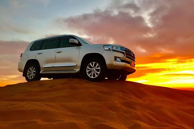 Abu Dhabi Desert Safari BBQ Dinner Live Shows Pick & Drop More - A carpeted camp with food and basic comforts