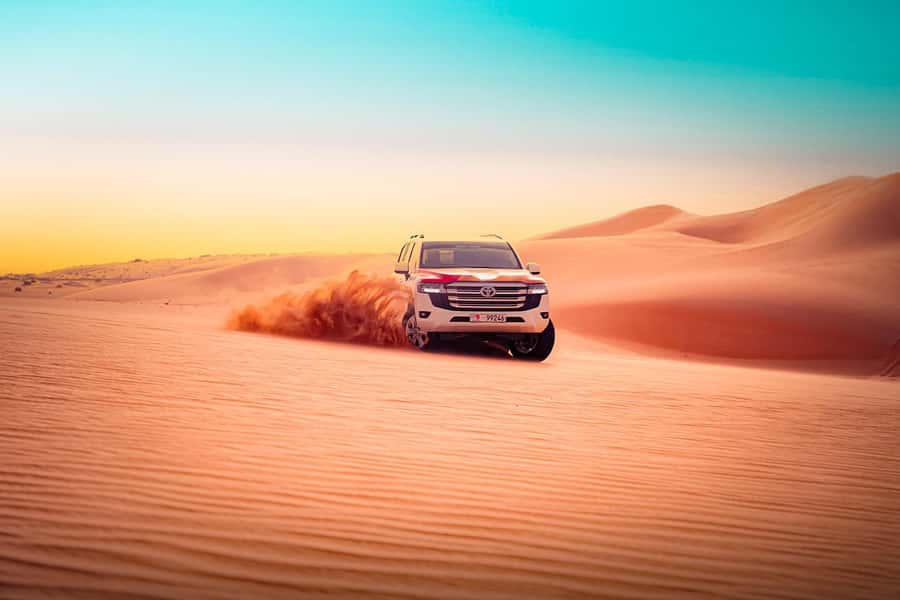 Abu Dhabi: Desert Safari with BBQ, Belly & Tannura Dance - From Abu Dhabi hotel to open desert