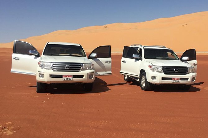 Abu Dhabi Desert Safari with BBQ Dinner & Shows - Dune bashing across the red sand