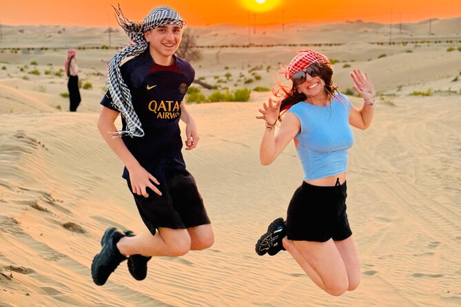 Abu Dhabi Desert Safari with Live Entertainment and Live BBQ - Sunset views and a Bedouin-style camp