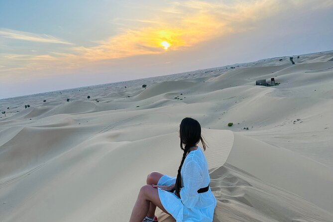 Abu Dhabi: Evening Desert Safari with Camel Ride, BBQ & Live Show - Belly dance, Tanoura, and stargazing after dark