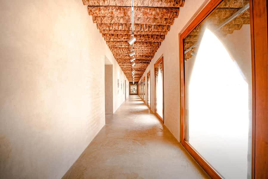 Abu Dhabi: Full-Day Al Ain Tour with Entry Tickets and Meal - Walking through Al Ain Oasis and its falaj channels