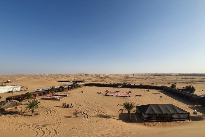 Abu Dhabi Half Day Desert Safari - Sandboarding at sunset