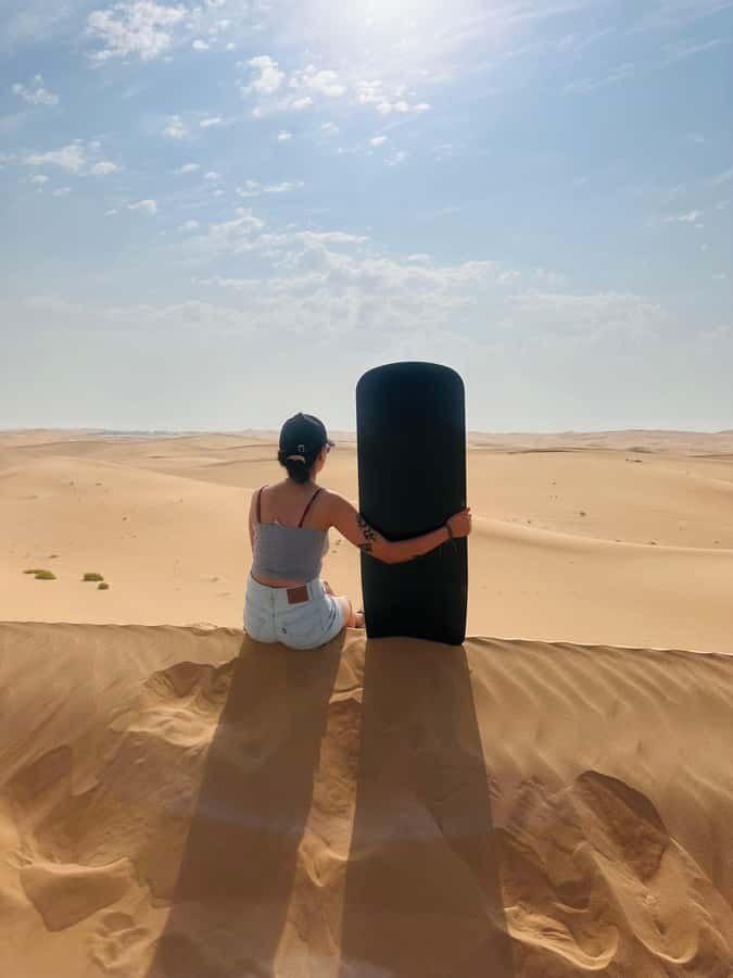 Abu Dhabi: Magical 4x4 Desert Tour with BBQ & Sandboarding - Sandboarding for a slower kind of thrill