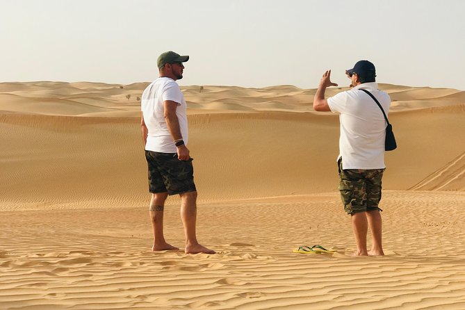 Abu Dhabi Morning Desert Safari,Dune Bashing,Sandboarding,Camel Riding&Quad Bike - Sandboarding looks easy until you try it