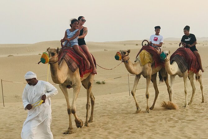 Abu Dhabi Morning Desert Safari,Dune Bashing,Sandboarding,Camel Riding&Quad Bike - Ten minutes on a quad bike