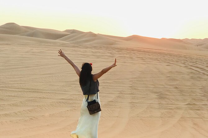 Abu Dhabi Private Desert Camping With BBQ Dinner - Sunset turns the sand copper and gold