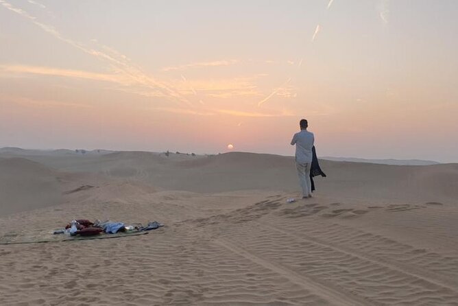 Abu Dhabi: Sunrise Desert Safari Experience - Guides, communication, and photographs