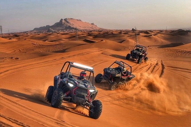 Adventurous Red Dune Desert Safari Deal with Quad Bike,Shows &BBQ - Dune bashing across Lahbab