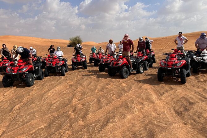 All in one Dubai Desert Safari ATV or Buggy Camelride BBQ Dinner - Al Awir shifts the mood from speed to camp life