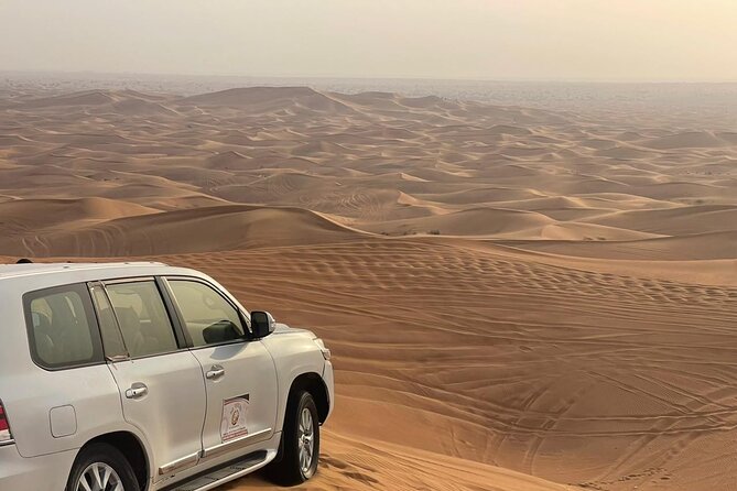 Desert safari adventure with BBQ dinner - Camel riding and sandboarding in 45 minutes