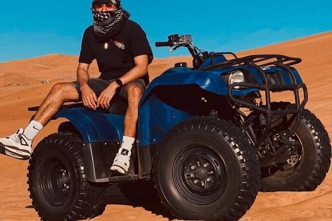 Desert Safari Dubai 25 minutes Quad Bike Free Camel Ride BBQ Dinner - Key points to know before booking