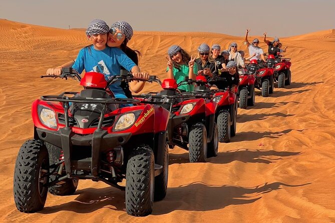 Desert Safari Dubai 25 minutes Quad Bike Free Camel Ride BBQ Dinner - Sandboarding and a short camel ride