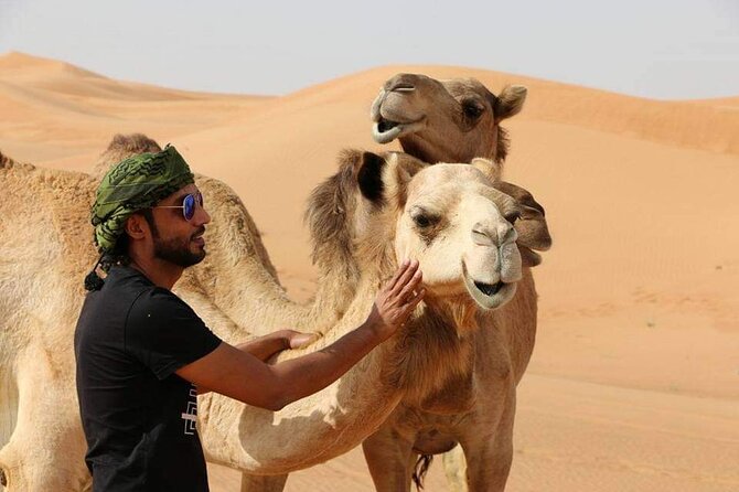 Desert Safari Dubai (VIP Package ) - Sandboarding on the soft slopes