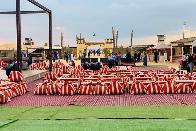 Desert Safari Dubai with BBQ Dinner & Camel Ride - Sandboarding on the golden dunes