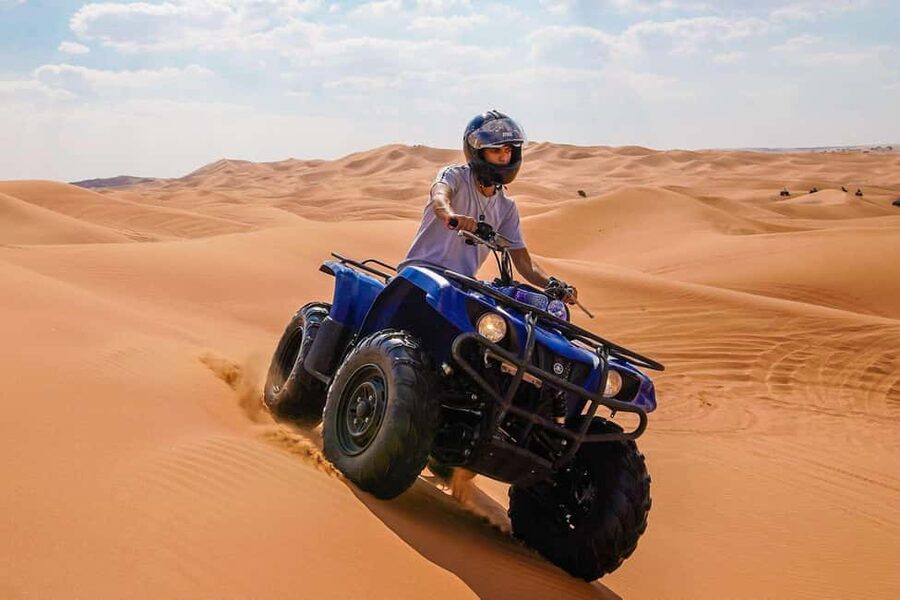 Desert Safari Dubai with Camel Ride, Sandboarding & Dinner - A 45-minute quad bike ride at Lahbab
