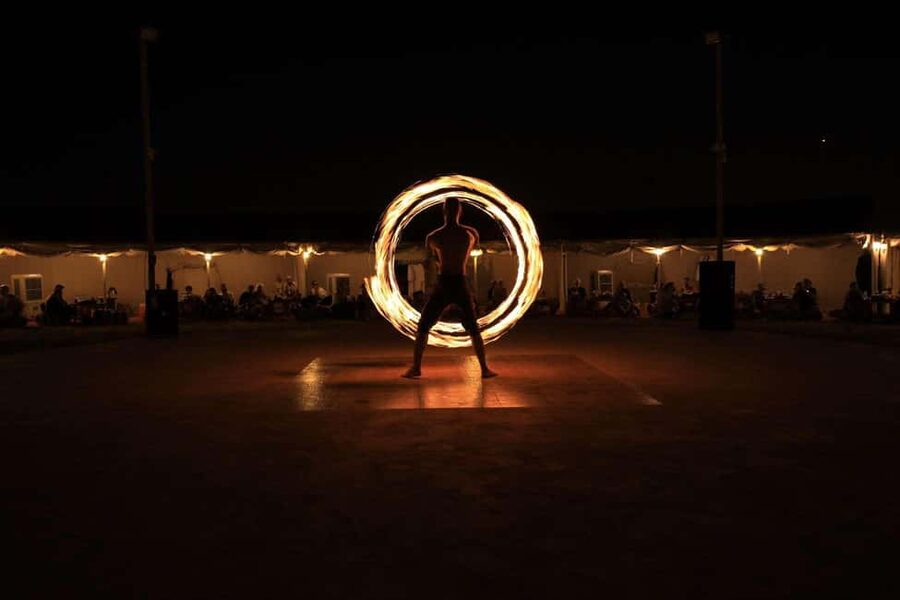 Desert Safari Dubai with Camel Ride, Sandboarding & Dinner - BBQ dinner and live evening entertainment