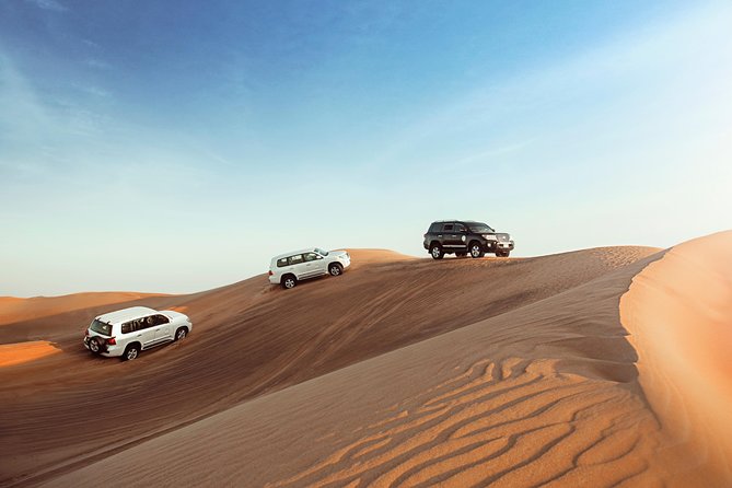 Desert Safari Dubai with Dune Bashing, Sandboarding, Camel Ride, 5 Shows, Dinner - Reaching Al Awir by 4x4