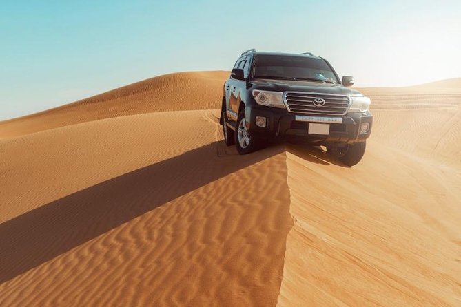 Desert Safari Dubai with Dune Bashing, Sandboarding, Camel Ride, 5 Shows, Dinner - Dinner and the evening shows