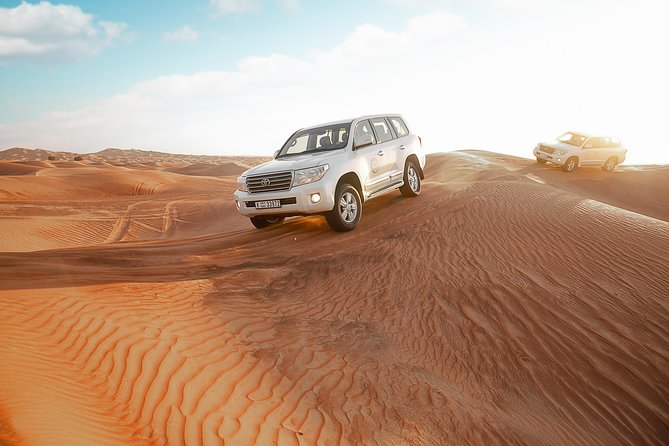 Desert Safari Dubai with Dune Bashing, Sandboarding, Camel Ride, 5 Shows, Dinner - Booking, cancellation, and timing advice