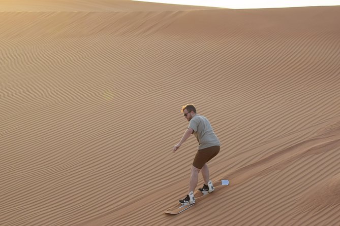 Desert Safari Tour, Quad Bike with BBQ Dinner & Show from Dubai - Dune bashing across the high sand