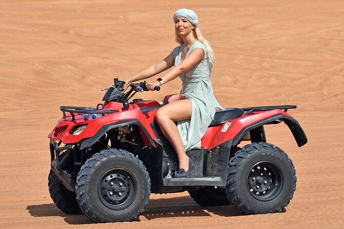 Desert Safari With BBQ Dinner, Quad Bike & Camel Ride from Dubai - Dune bashing across Lahbab