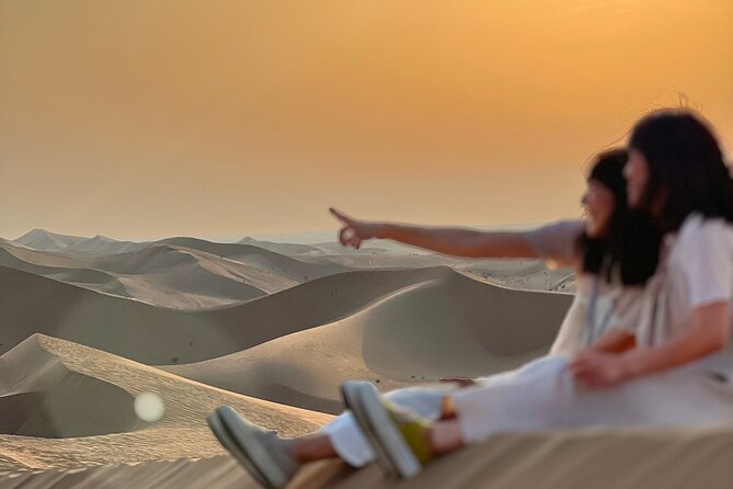 Desert Safari with Dune Bashing and Camel Ride plus Sand Boarding - A quick stop at the camel farm