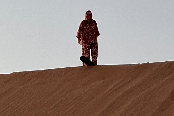 Desert Safari with Dune Bashing and Camel Ride plus Sand Boarding - Arriving at the Bedouin-style camp