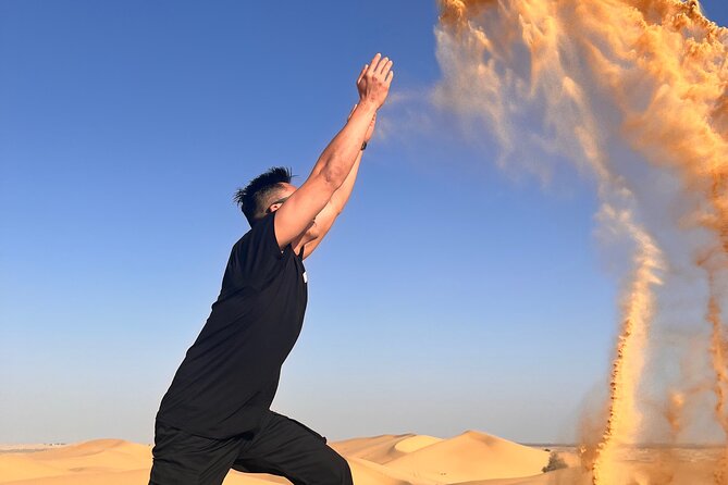 Desert Safari with Dune Bashing and Camel Ride plus Sand Boarding - Camel riding, sand boarding, henna, and falcon photos