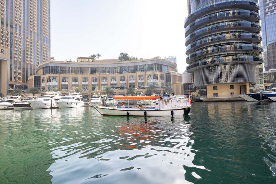 Dubai: Abra Boat Tour in Dubai Marina, Ain Dubai, JBR - Dubai Marina Mall and the changing city view