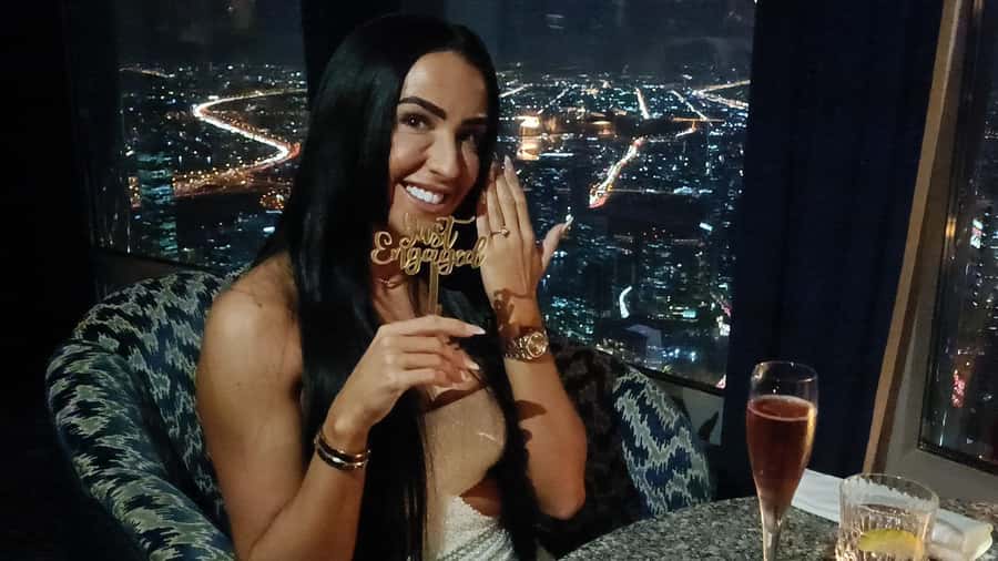 Dubai: Burj Khalifa Sunset Engagement with Porsche Pickup - A proposal planned around the surprise