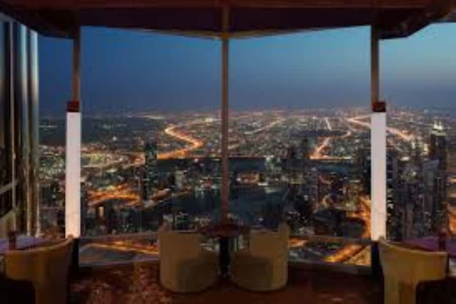 Dubai: Burj Khalifa Sunset Engagement with Porsche Pickup - Cocktails, perfume, and a dinner above the fountains