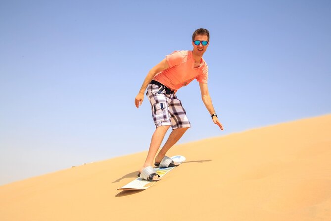 Dubai City Tour and Evening Desert Safari Combo - Sandboarding and the desert sunset