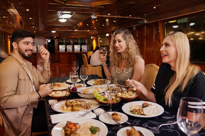 Dubai Creek Luxury Dhow Dinner Cruise with Optional Transfer - A night view of old Dubai from the Creek