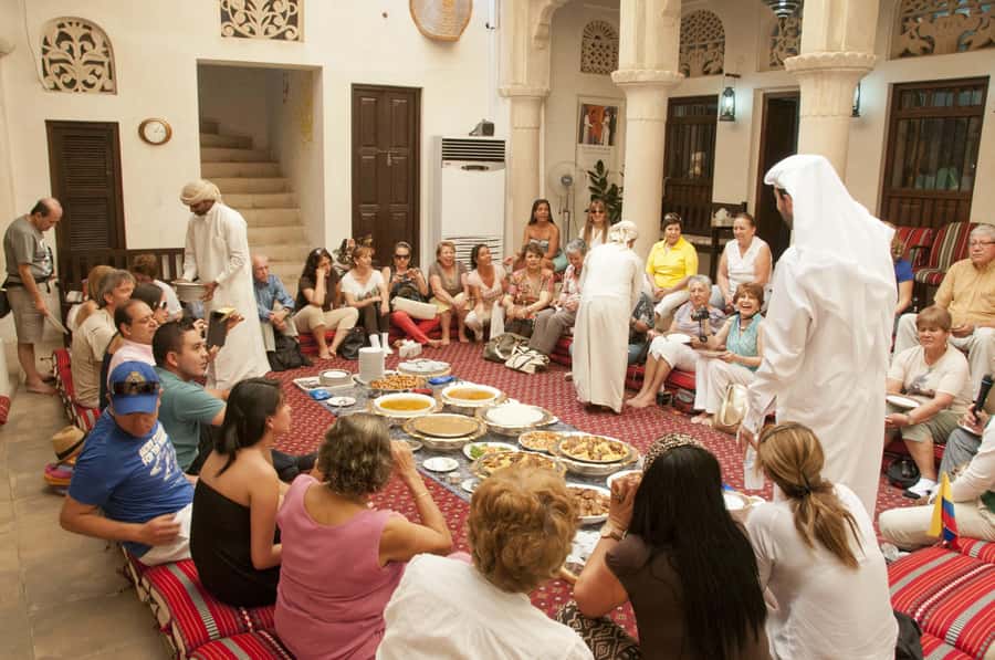Dubai: Cultural Lunch at The Sheikh Mohammed Center - Settling onto floor cushions for lunch