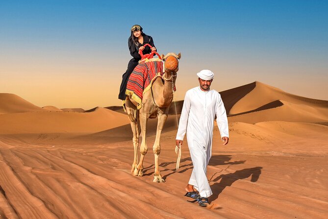 Dubai Desert Adventure Half-Day Tour - Sandboarding on soft desert slopes