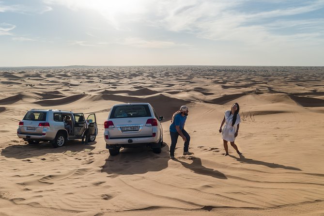 Dubai Desert Discovery: Red Dunes Safari, Sandboard & Camel Ride - Sandboarding is easy, but the stop is brief