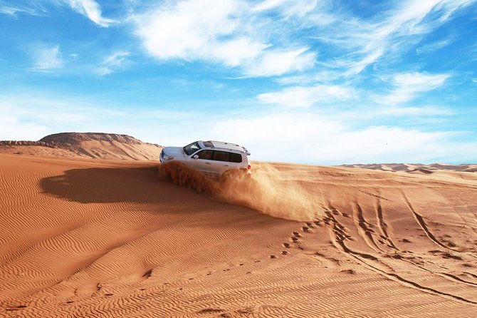 Dubai Desert Journey: Red Dunes Safari with BBQ in Bedouin Camp - Leaving Dubai for the red dunes