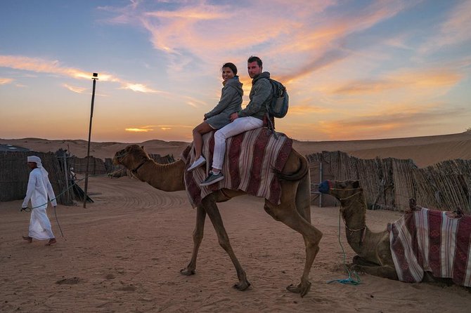 Dubai Desert Journey: Red Dunes Safari with BBQ in Bedouin Camp - Sandboarding and sunset over Lahbab