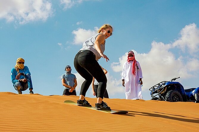 Dubai Desert Safari Adventure, 60mins ATV, Camel Ride, Shows, BBQ - Dune bashing in a Land Cruiser