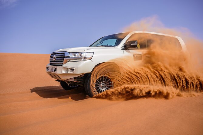 Dubai Desert Safari, BBQ, Live Shows, Camel, Sandboard (7-Hours) - At a glance: what your evening includes