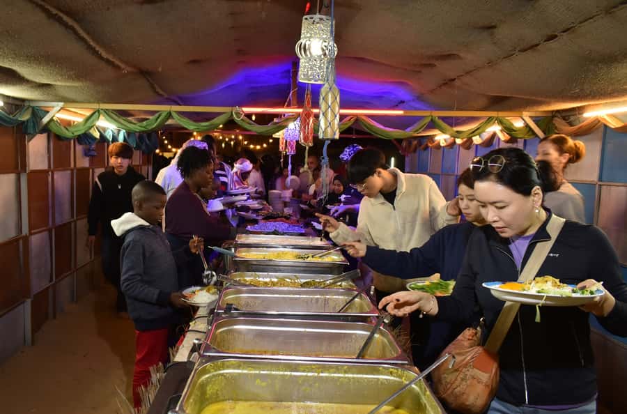Dubai: Desert Safari, Camel Ride, and BBQ Dinner - Camels, coffee, and a small taste of desert customs